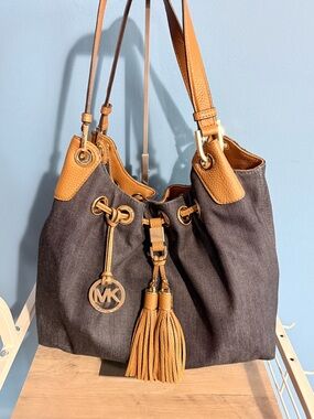 Michael Korrs Blue Denim Canvas Tote with Tan Leather Trim and Tassel